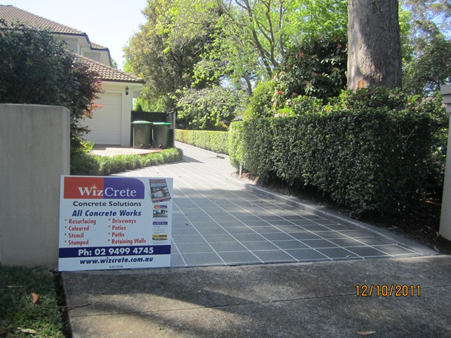 Concrete resurfacing over pebblecrete